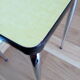 Yellow formica and chrome metal barstool