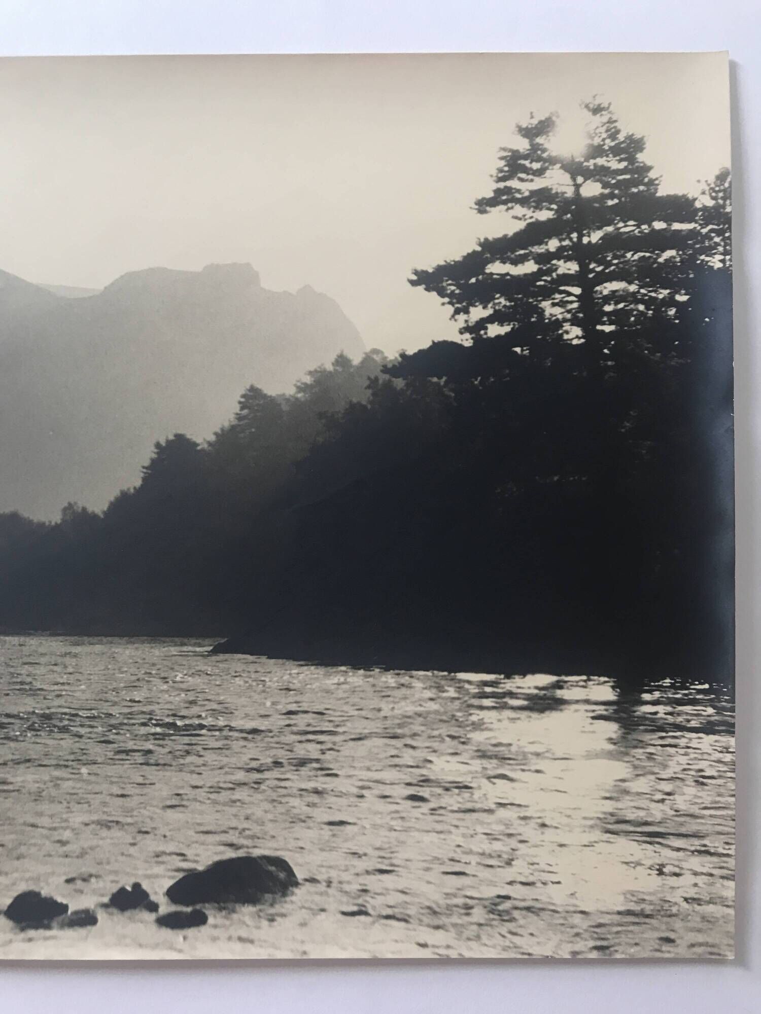 River landscape with characters, 60s/70s. Black and white silver print.