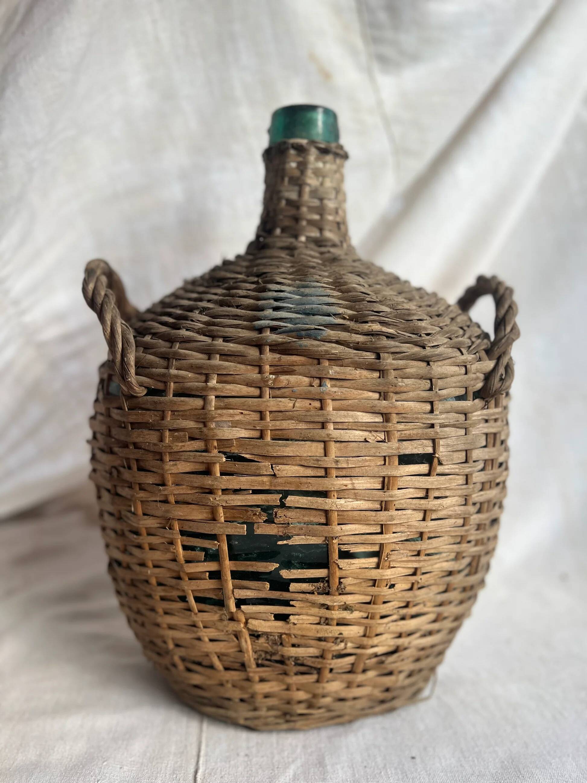 Vintage Spanish wicker demijohn bottle