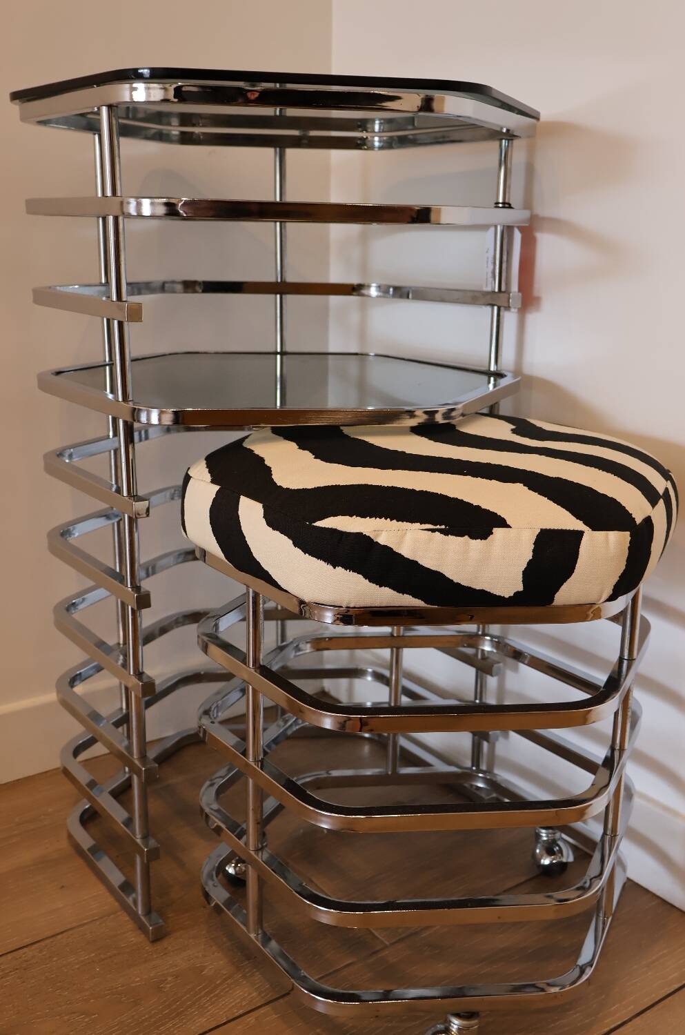 Chrome and smoked glass dressing table with a nesting seat, 1970.