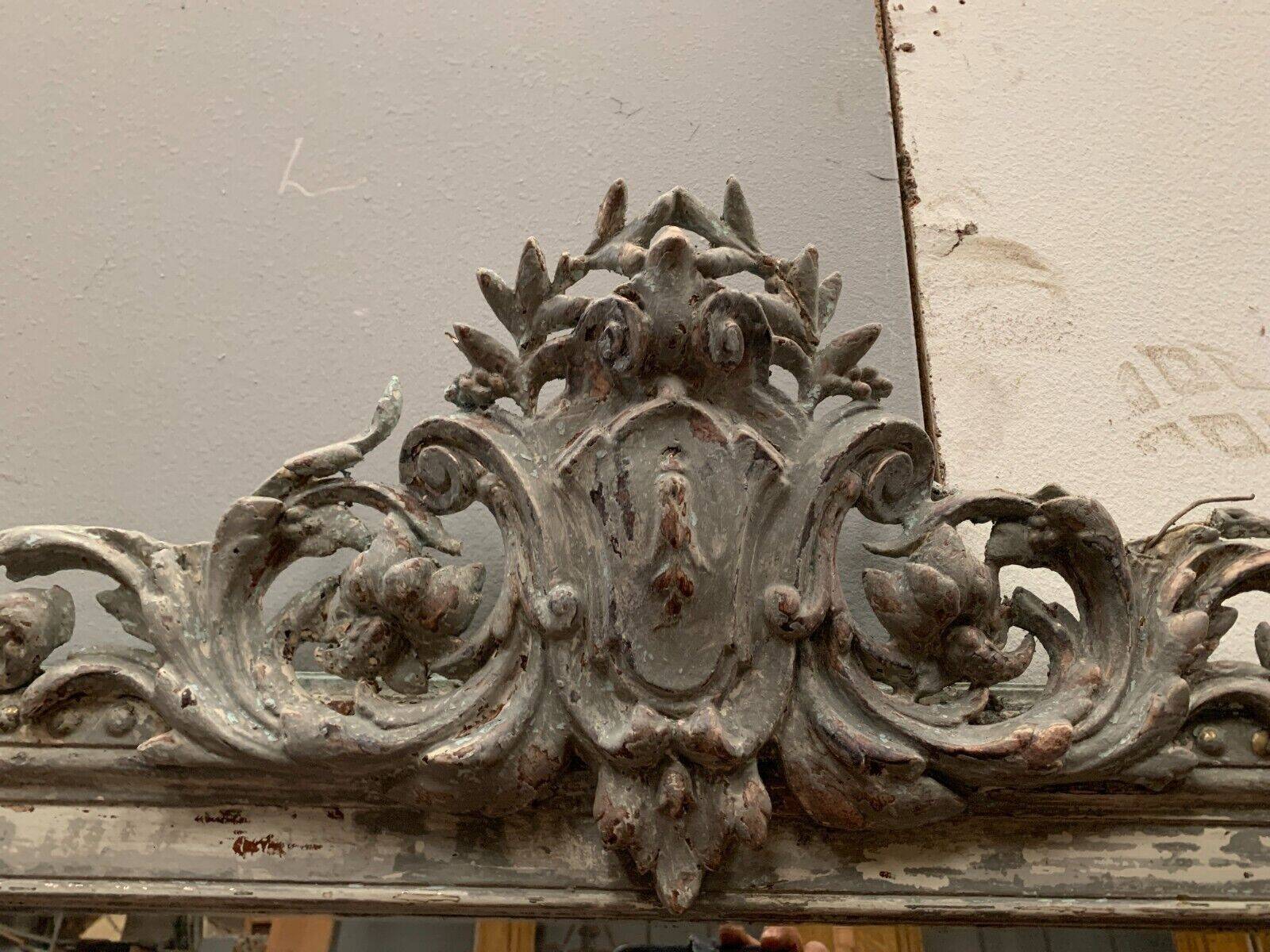 Louis XV style mirror in wood and patinated stucco 19th century