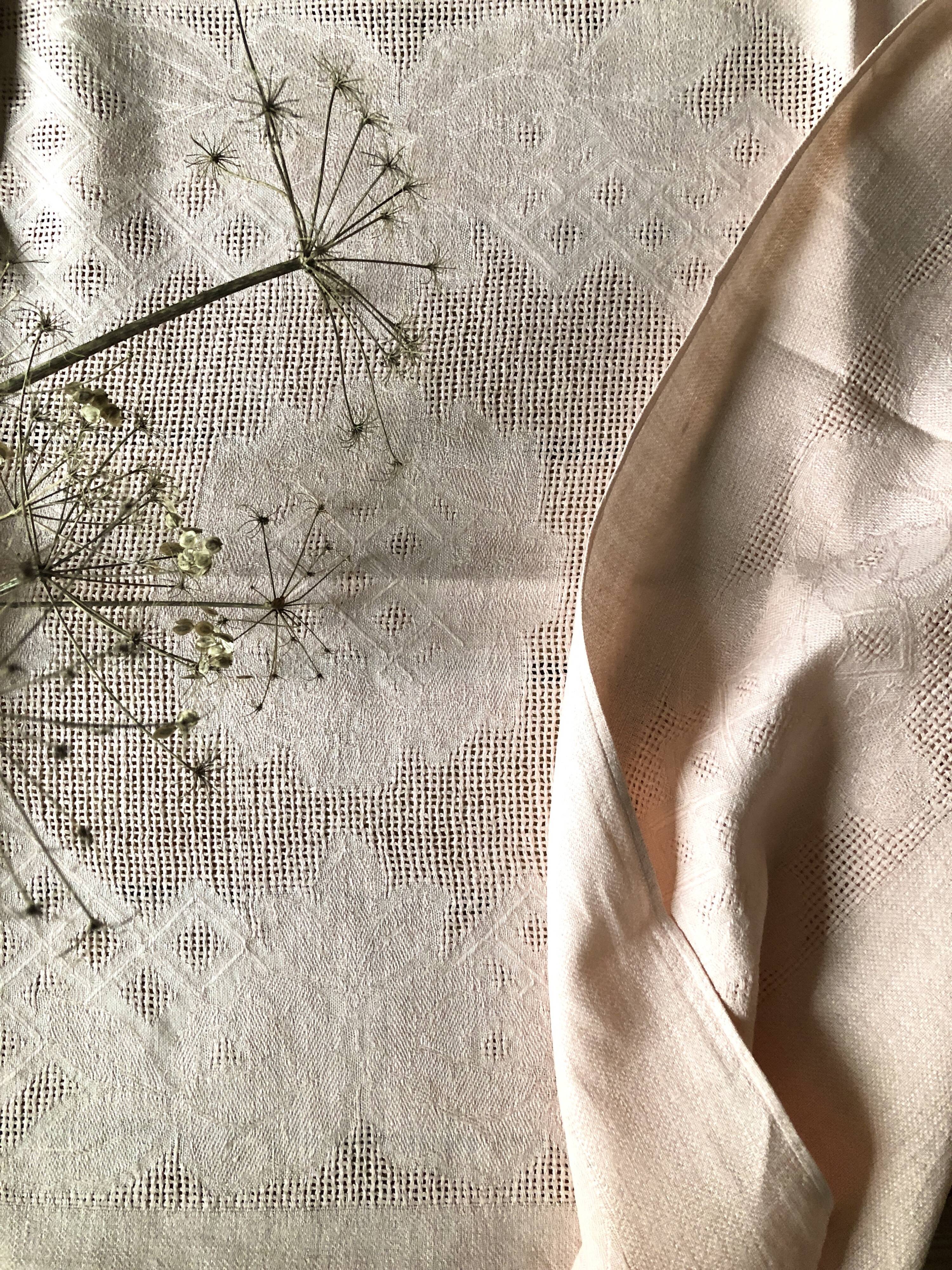 Antique tablecloth in pure linen tinted coral pink