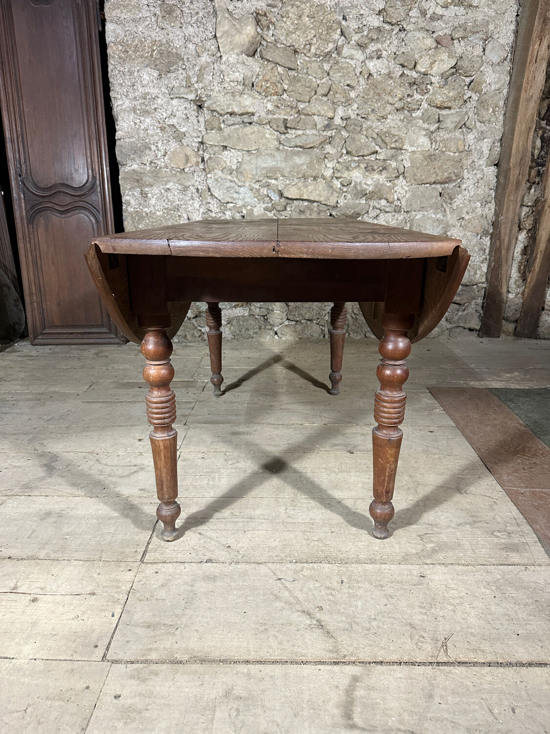 Ancienne table à volets ovale