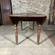Antique oval drop-leaf table