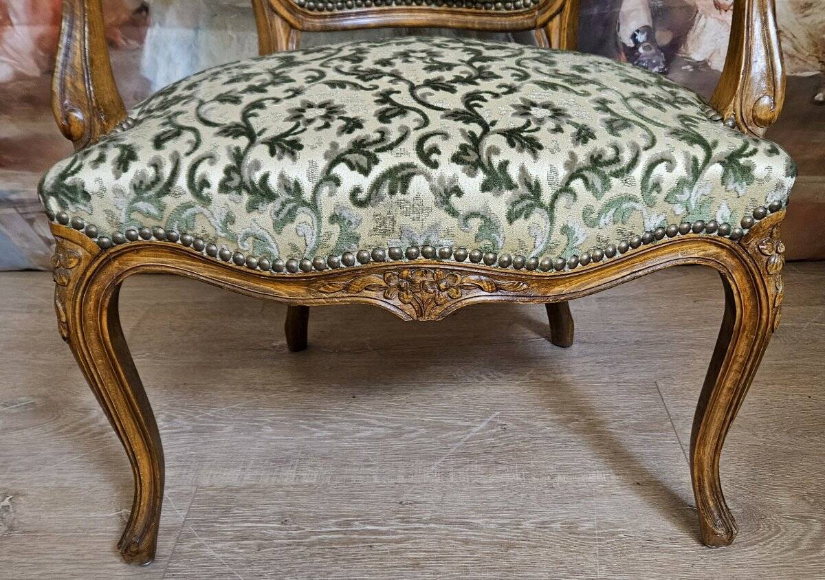 Louis XV style armchair, accompanied by its matching footrest.