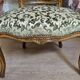 Louis XV style armchair, accompanied by its matching footrest.