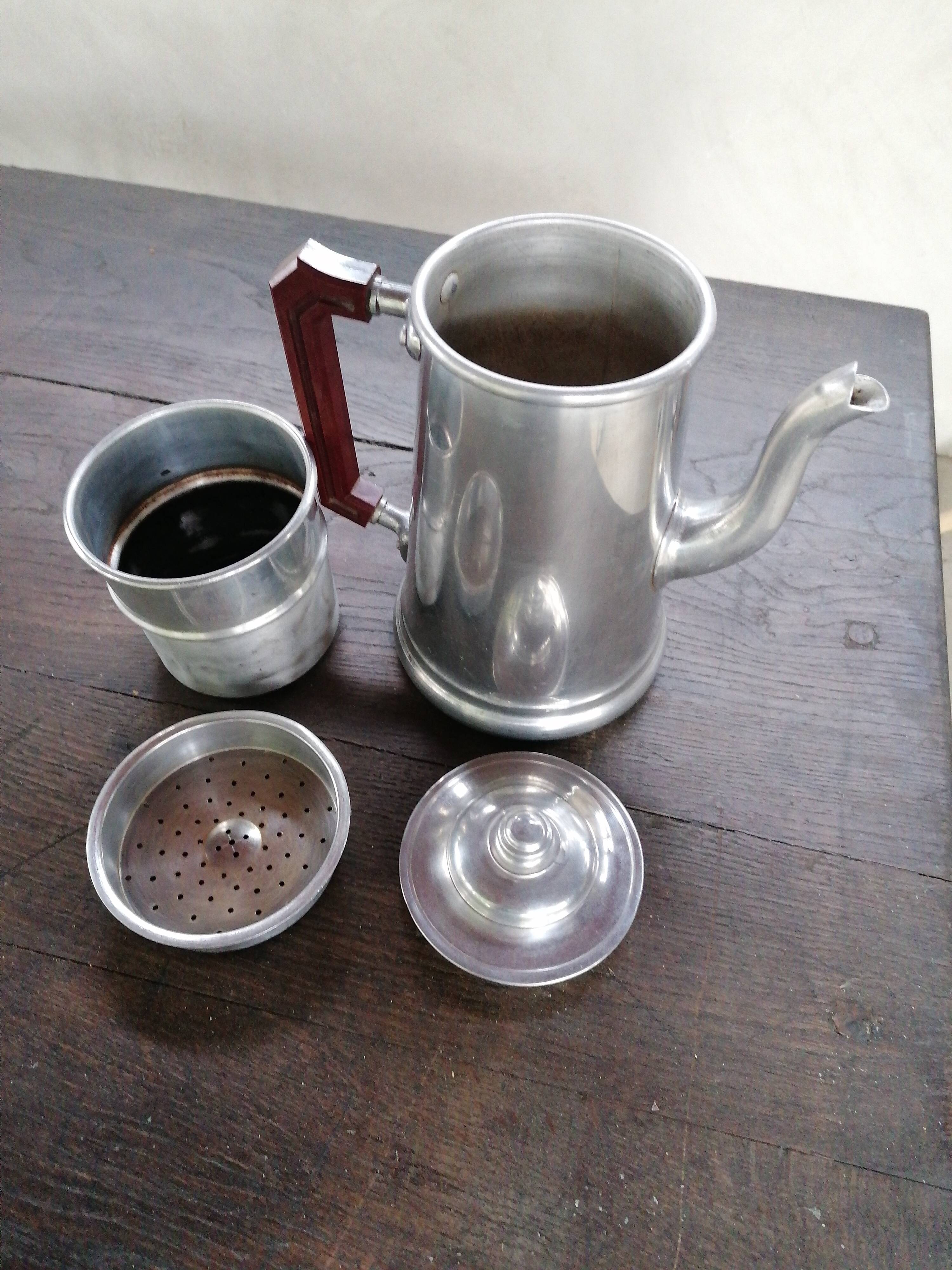 Vintage coffee maker in grey metal and bakelite handle