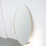 Vintage oval golden frame mirror, 70s