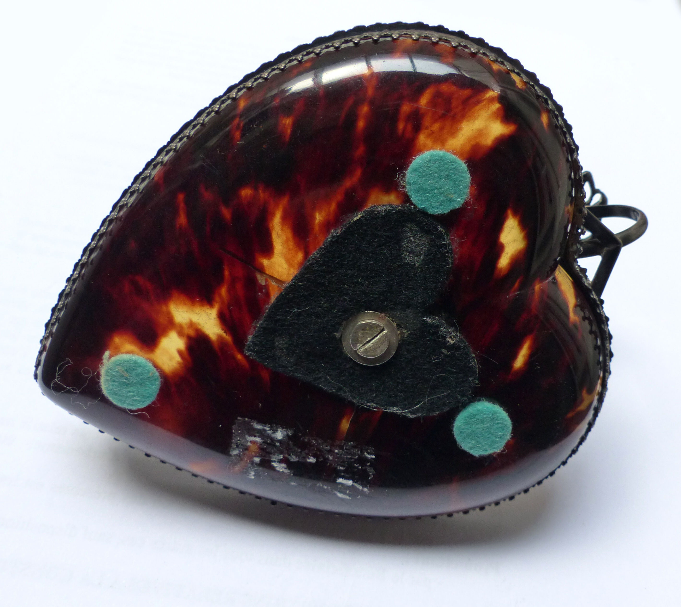 Scaled and silver table candle holder