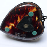 Scaled and silver table candle holder