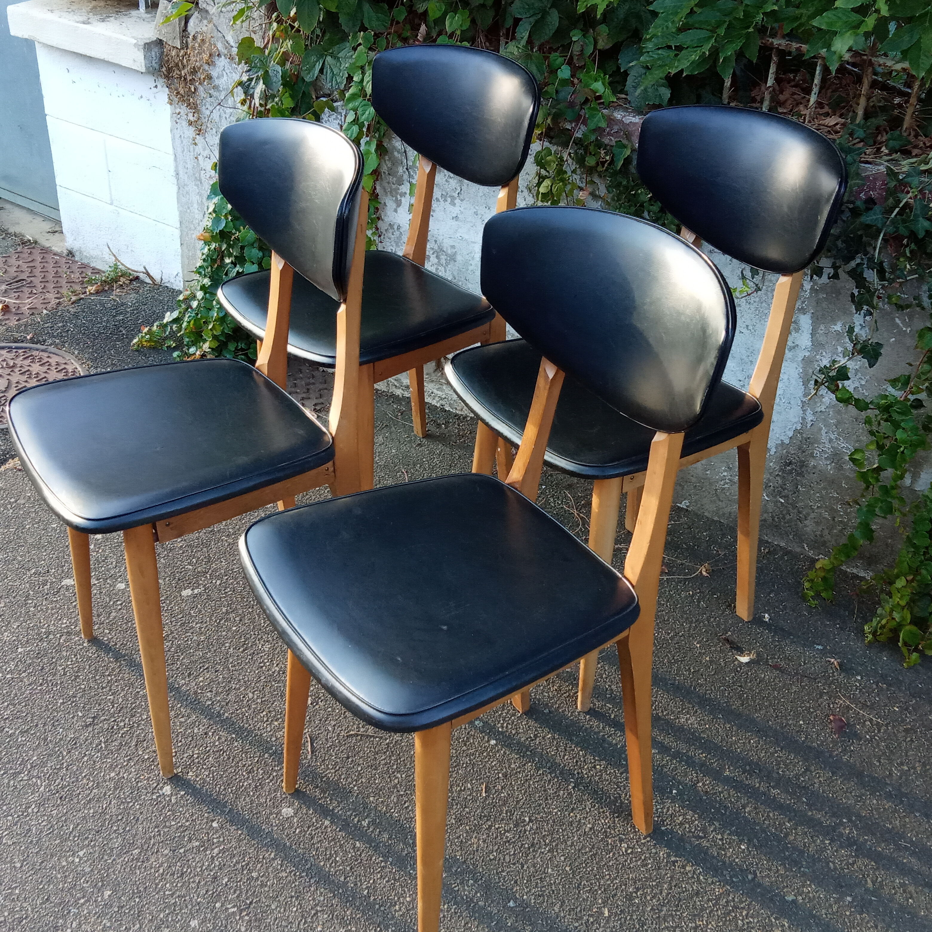 Four chairs in skaï, Scandinavian style, 60s