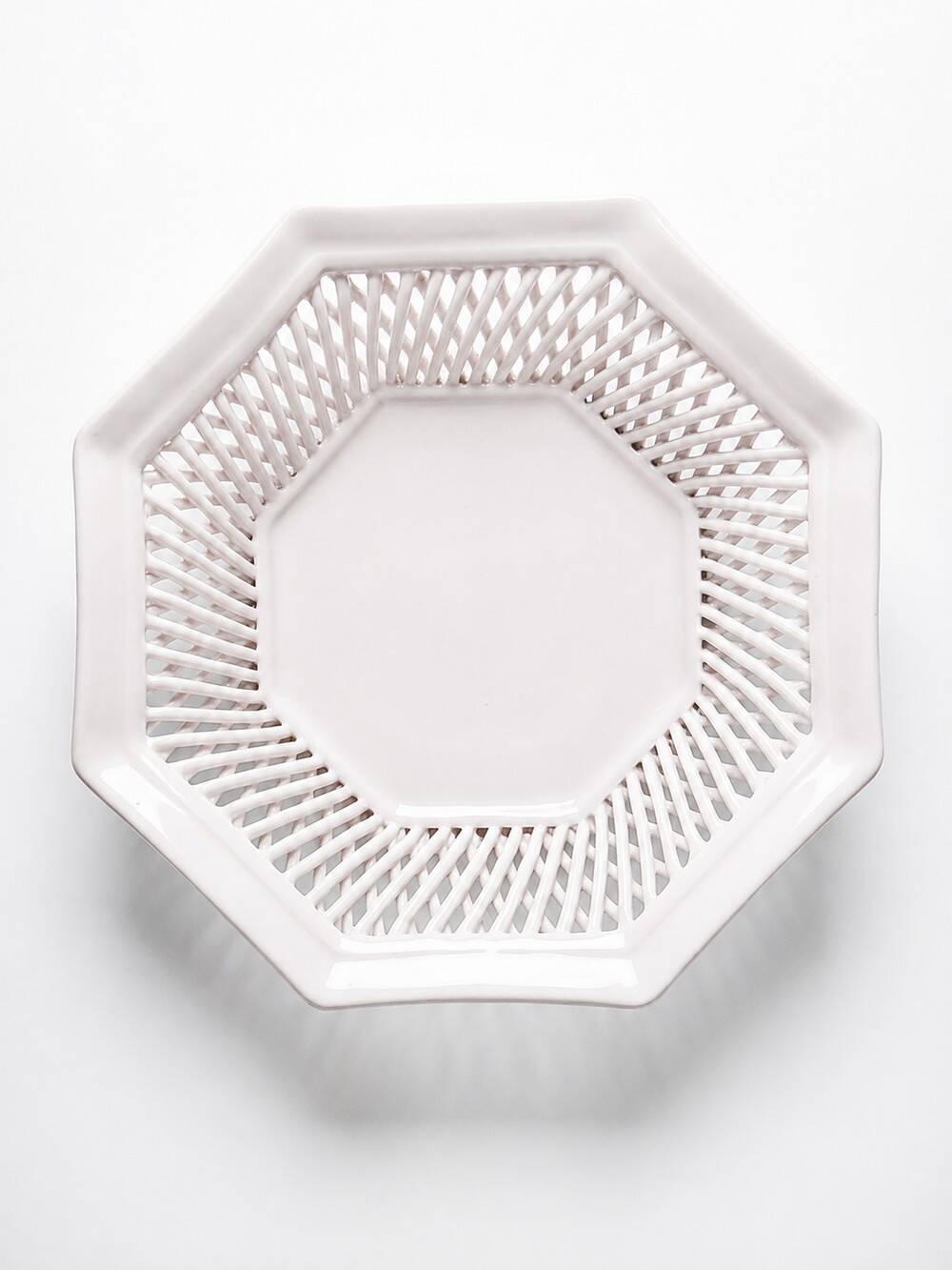 Pale pink woven octagonal porcelain bowl, circa 1950.