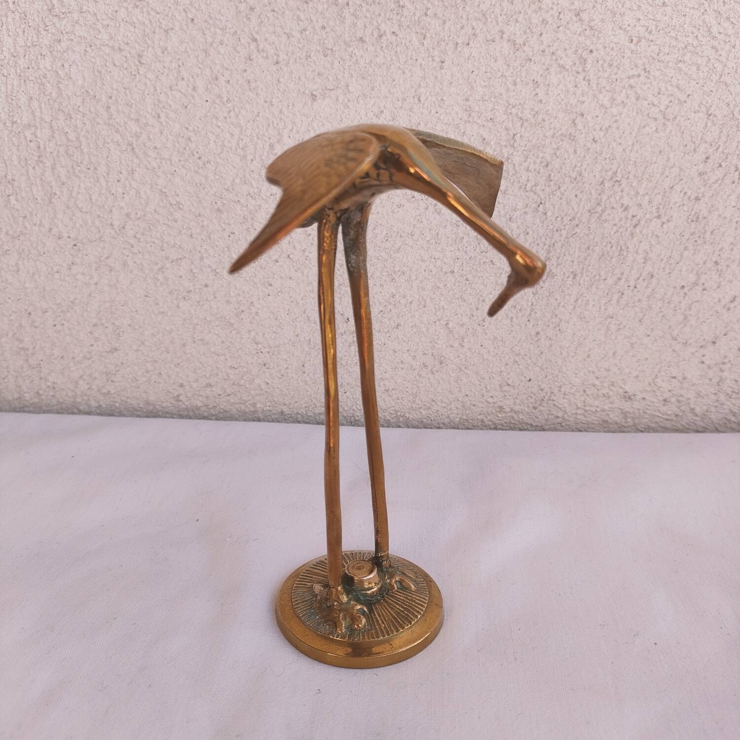 Trio of brass waders