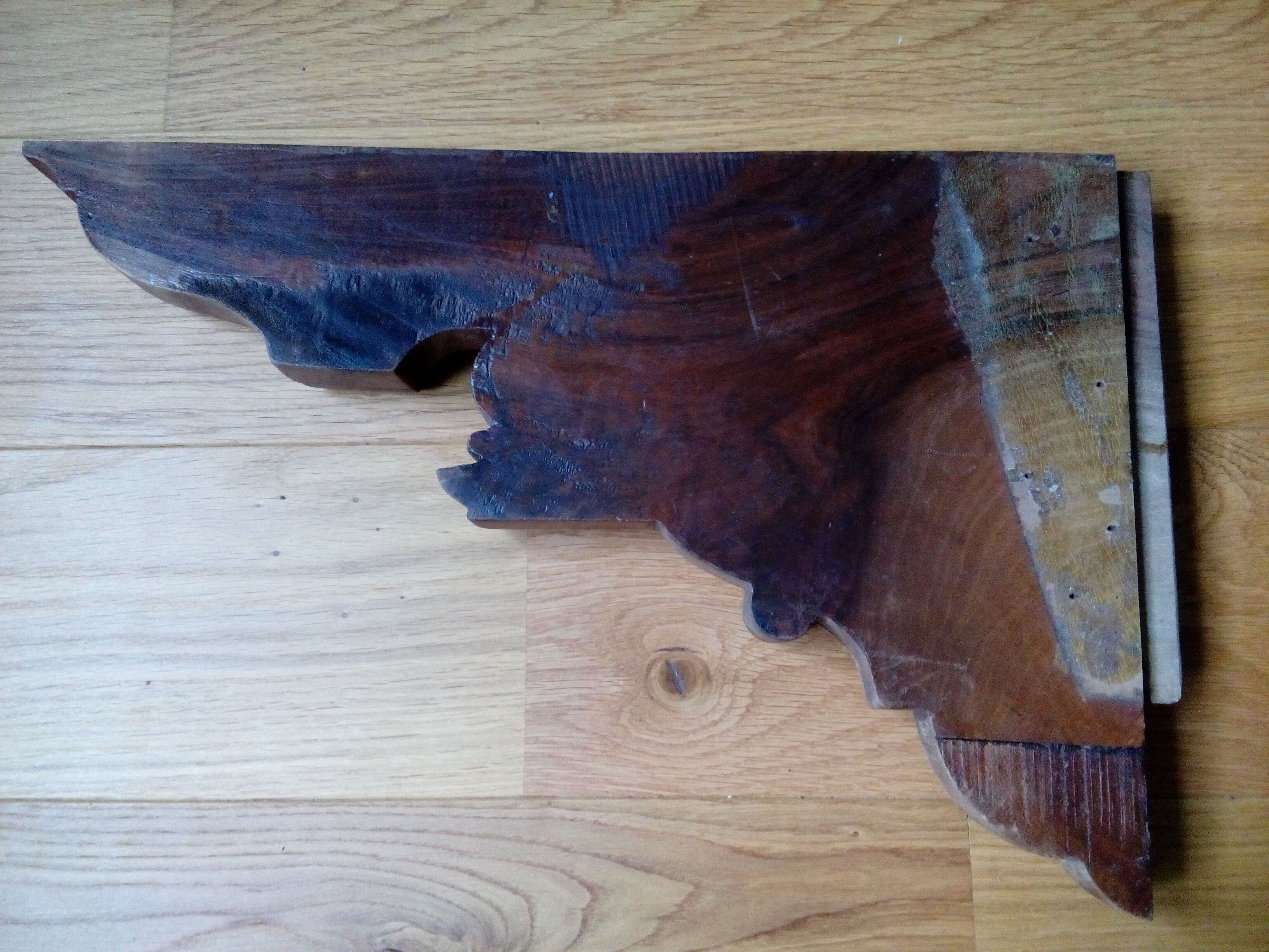 Carved wooden pediment