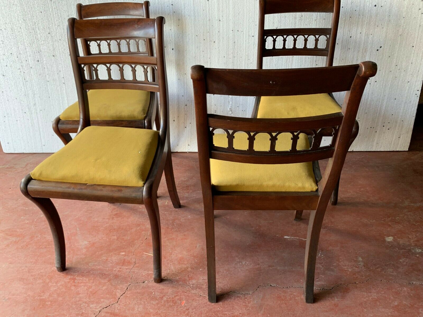 Four 2th century mahogany board-style chairs