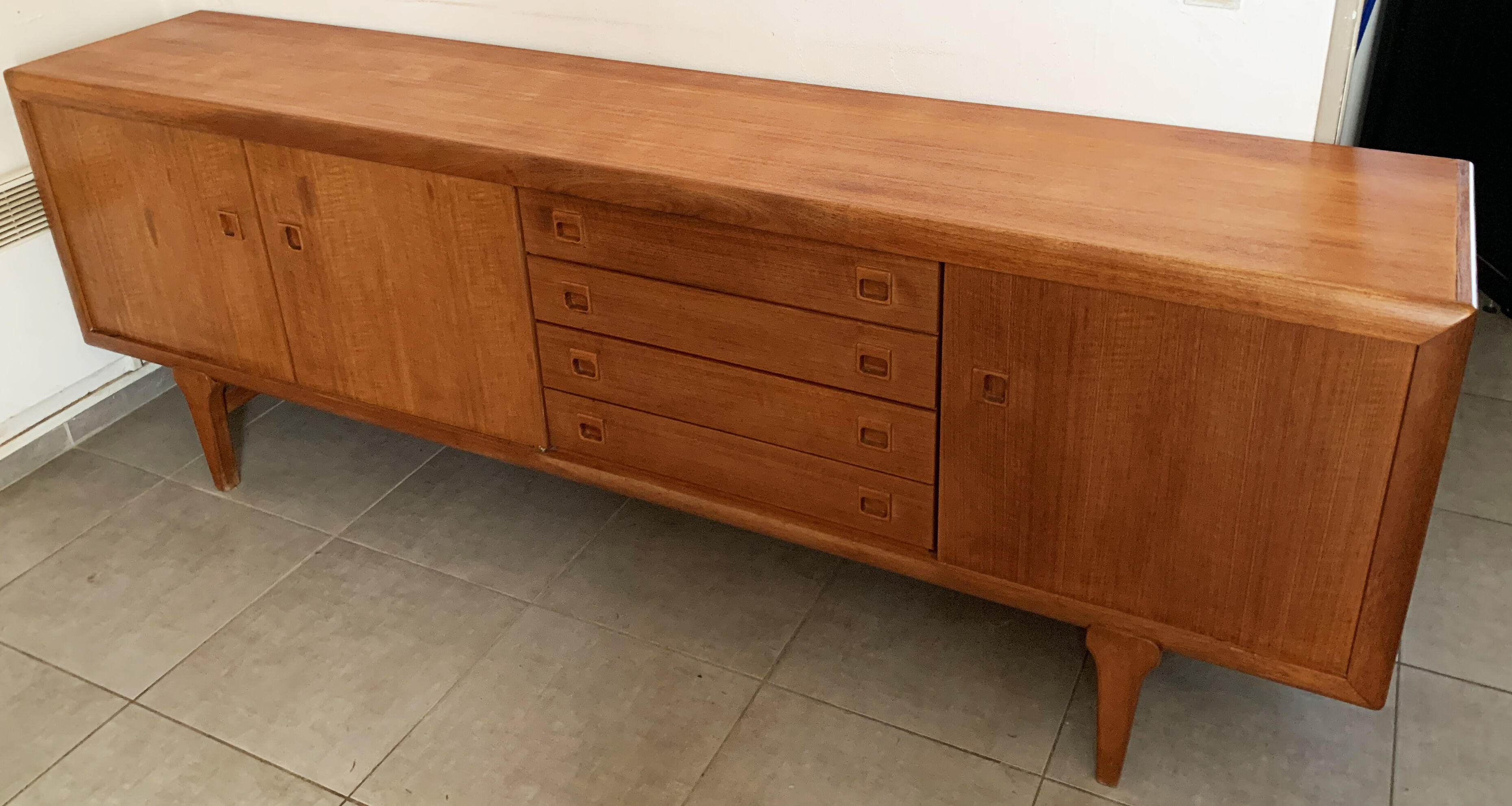 Large Danish vintage row in blond teak from the 60s