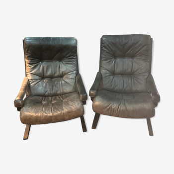 2 fauteuils en cuir