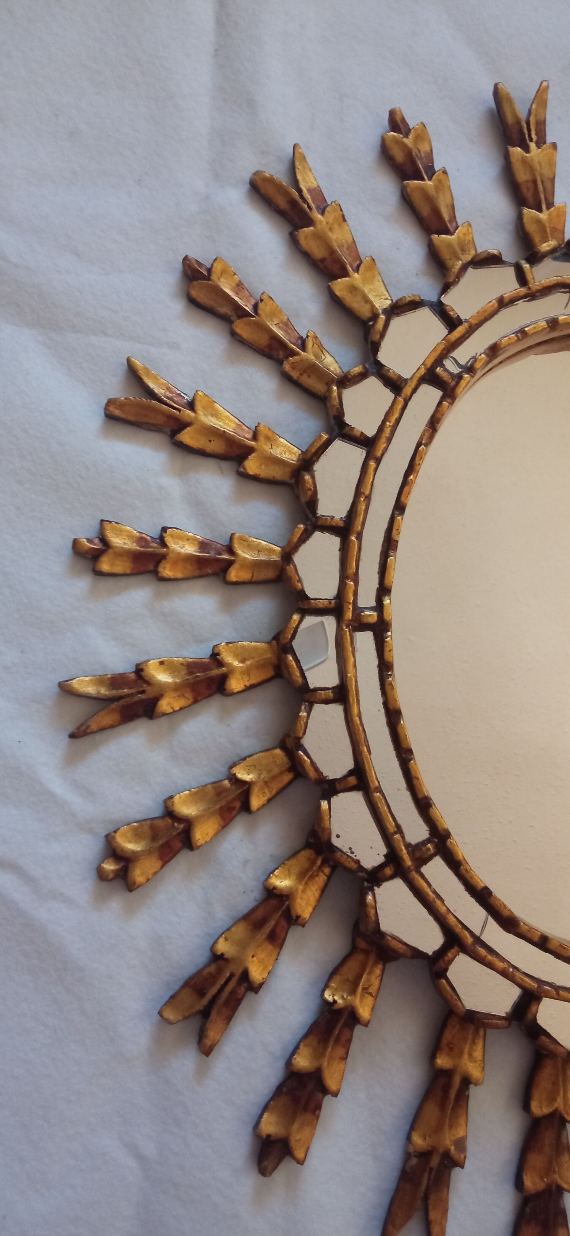 Sun mirror in gilded wood, 60x52 cm