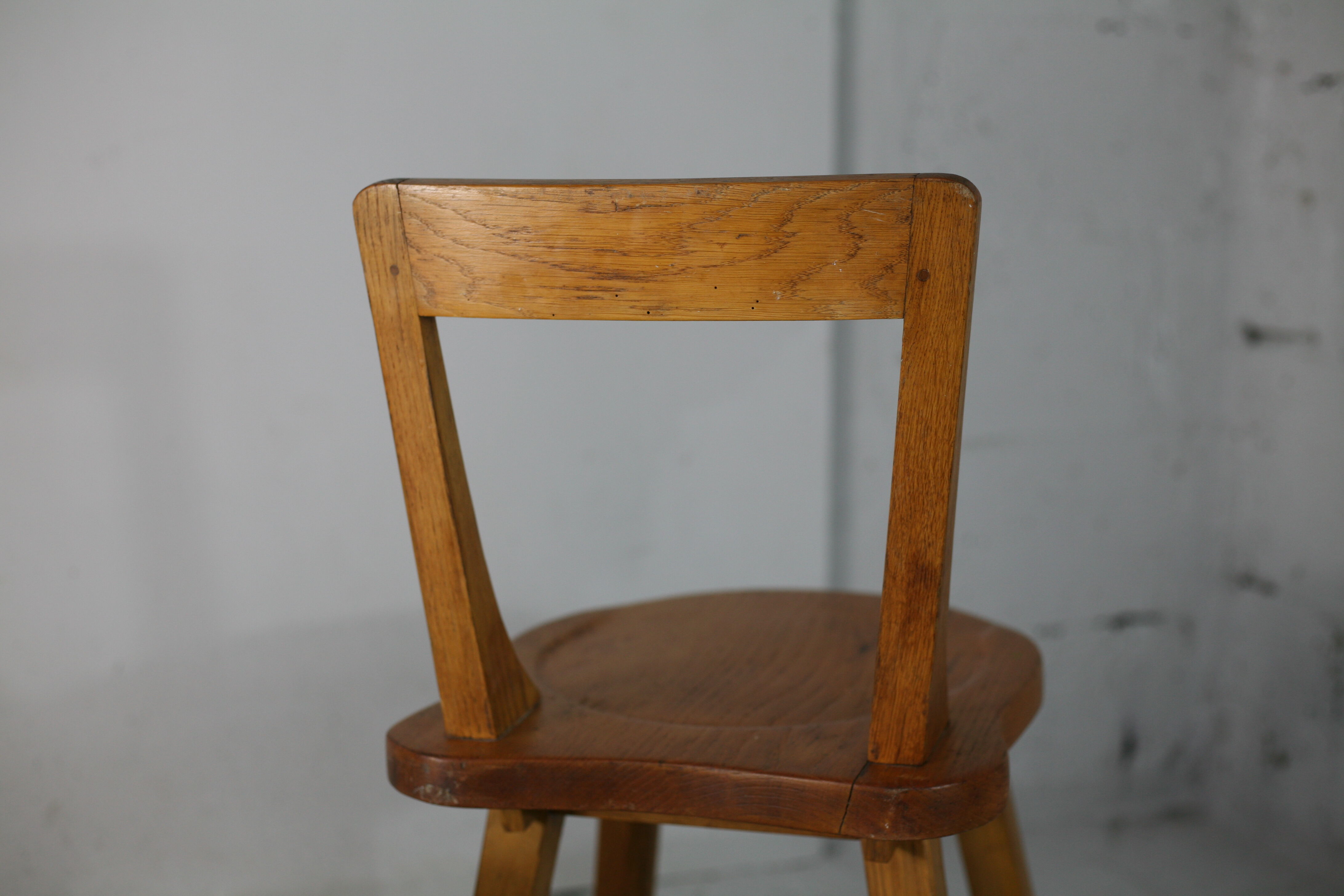 Pair of brutalist wooden back stools. France, circa 1960