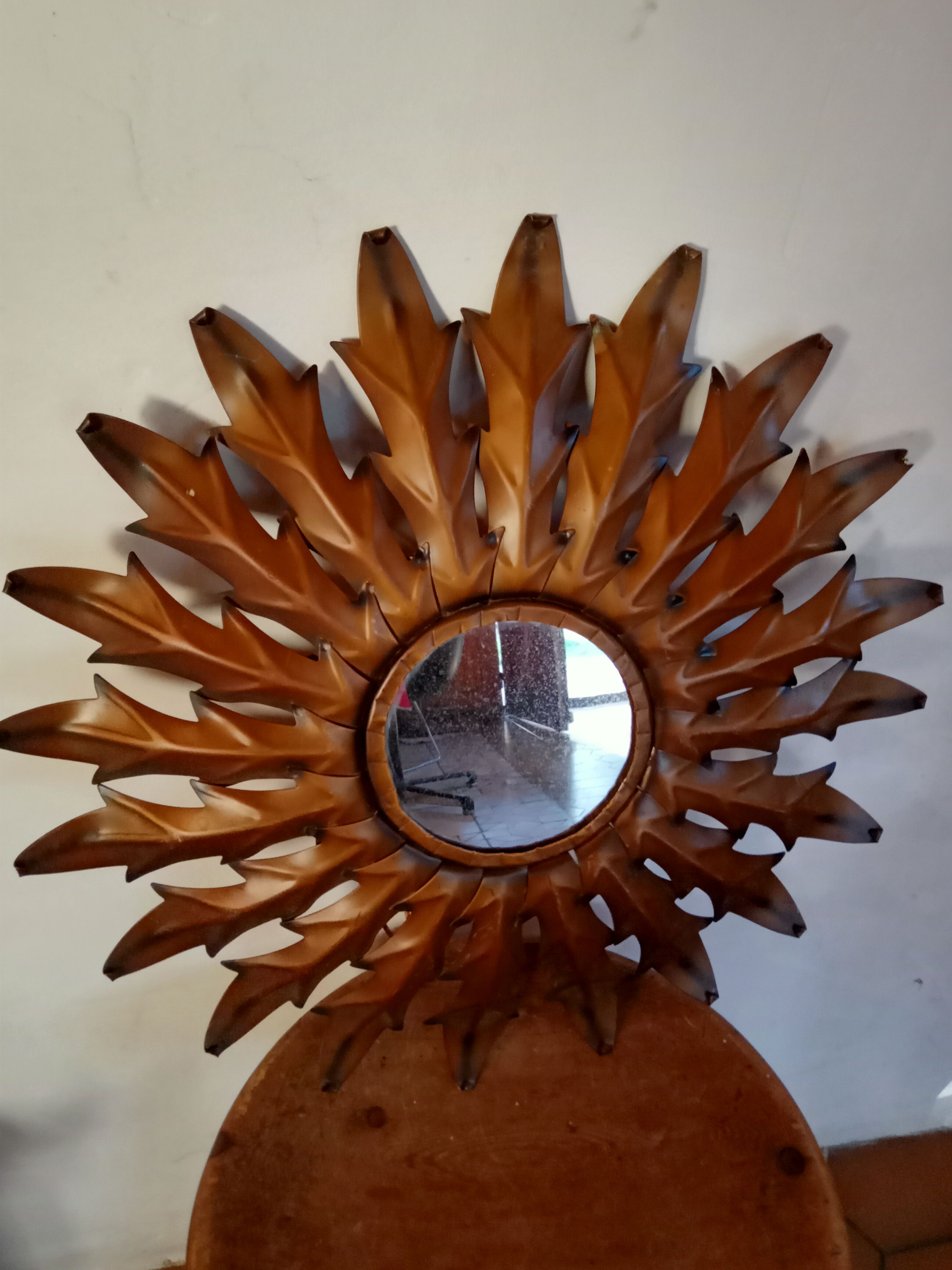 Vintage metal sun mirror