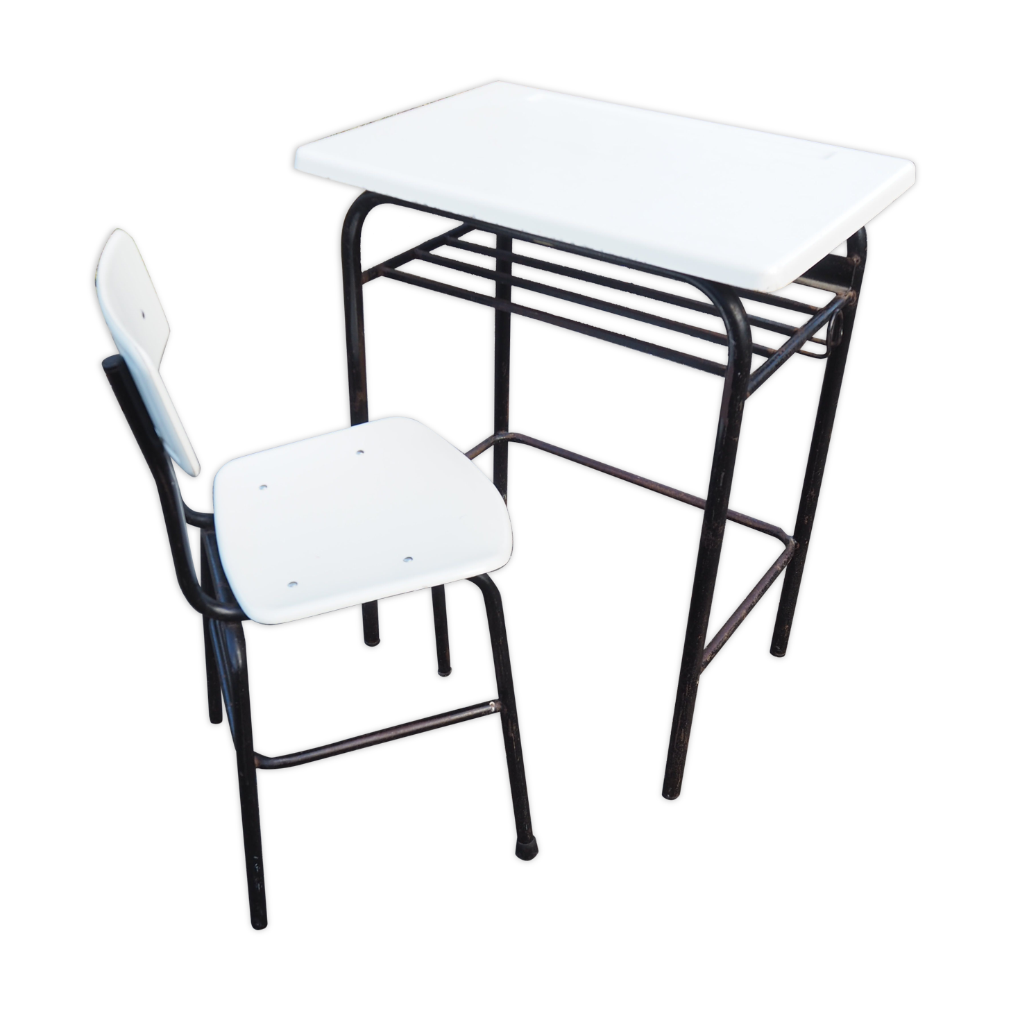 Schoolboy style desk with its white adult size chair