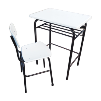 Schoolboy style desk with its white adult size chair