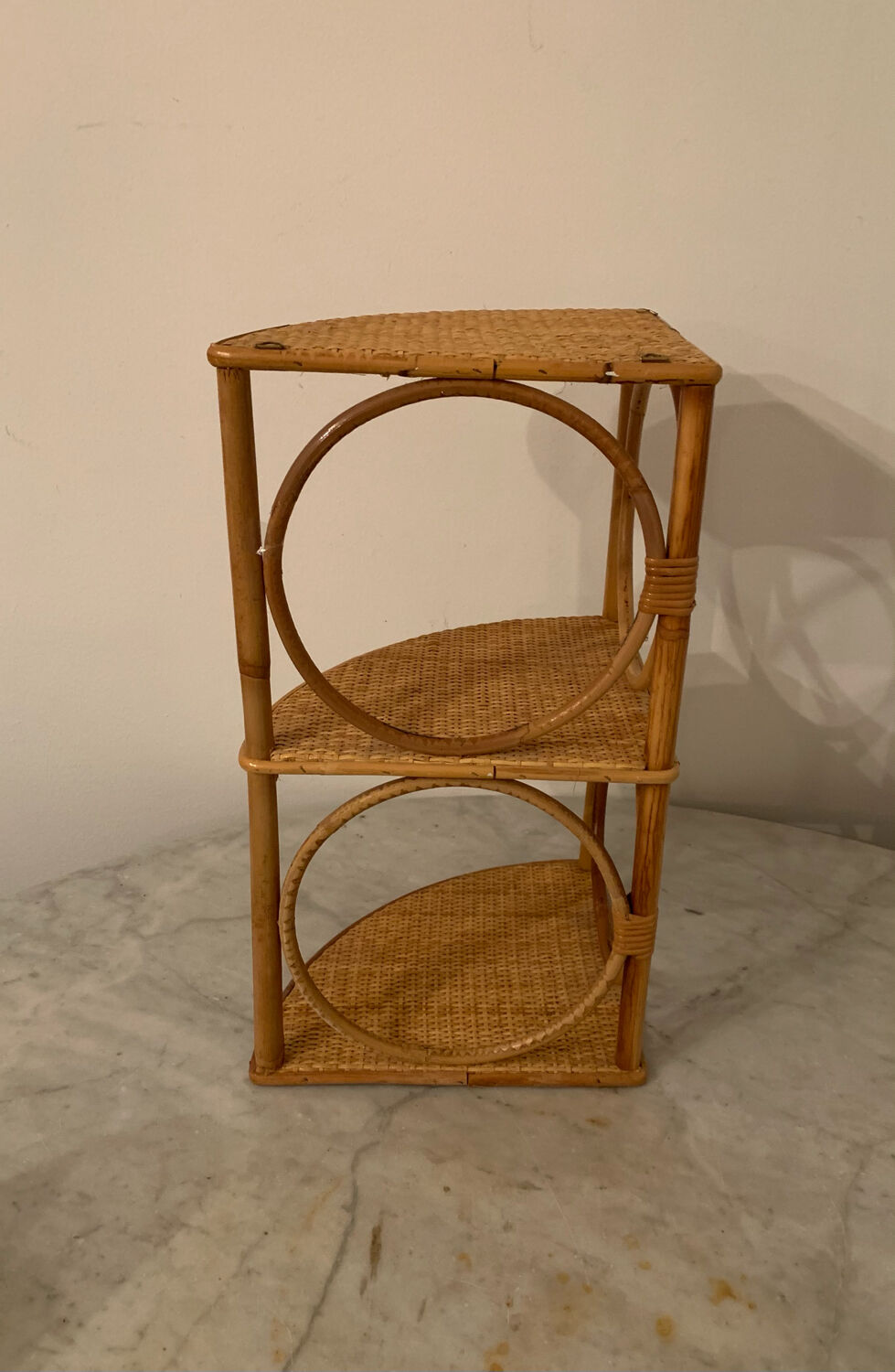 Rattan corner shelf