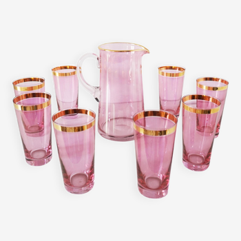 Lot de 8 verres et leur carafe rose en verre soufflé 1950