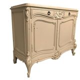 Low rocaille style sideboard in cream lacquered wood, circa 1900