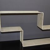 Dedal shelf by Mathieu Matégot in perforated iron