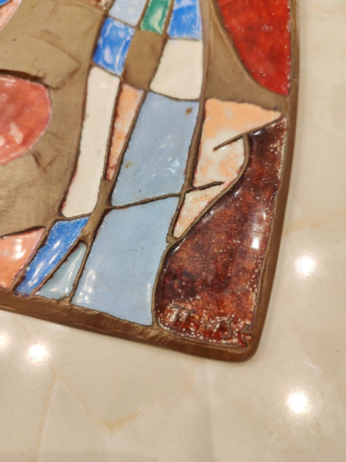 Isaac Lane Muse, brass and enamel plaque.