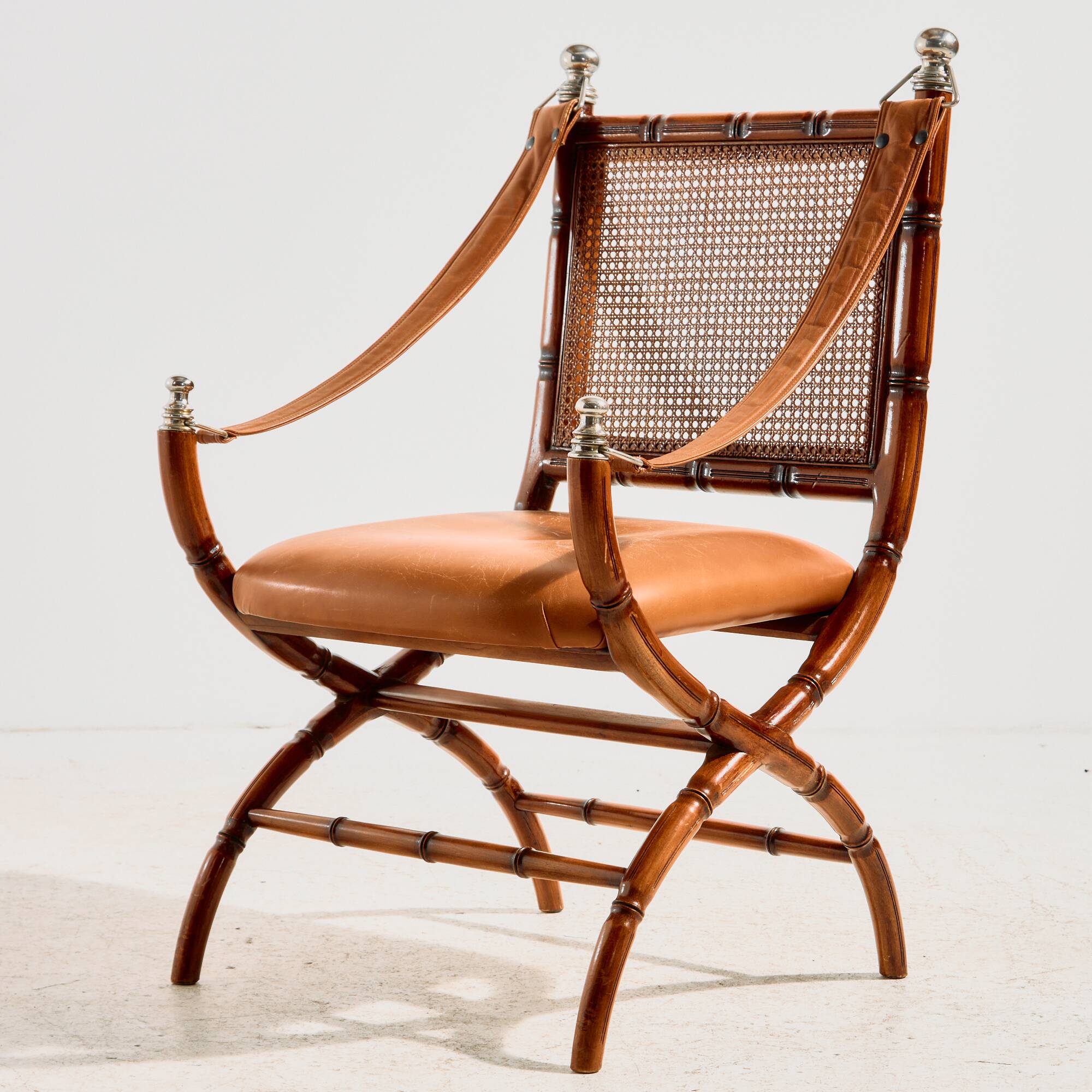 Walnut armchair with bamboo design