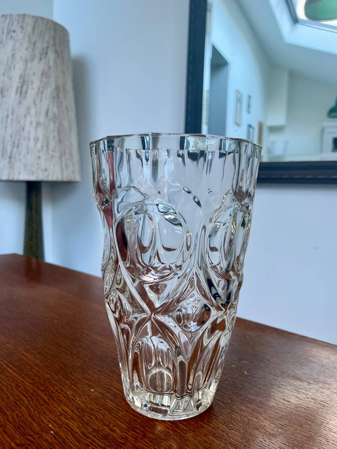 Molded glass vase with sculpted decoration