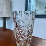 Molded glass vase with sculpted decoration
