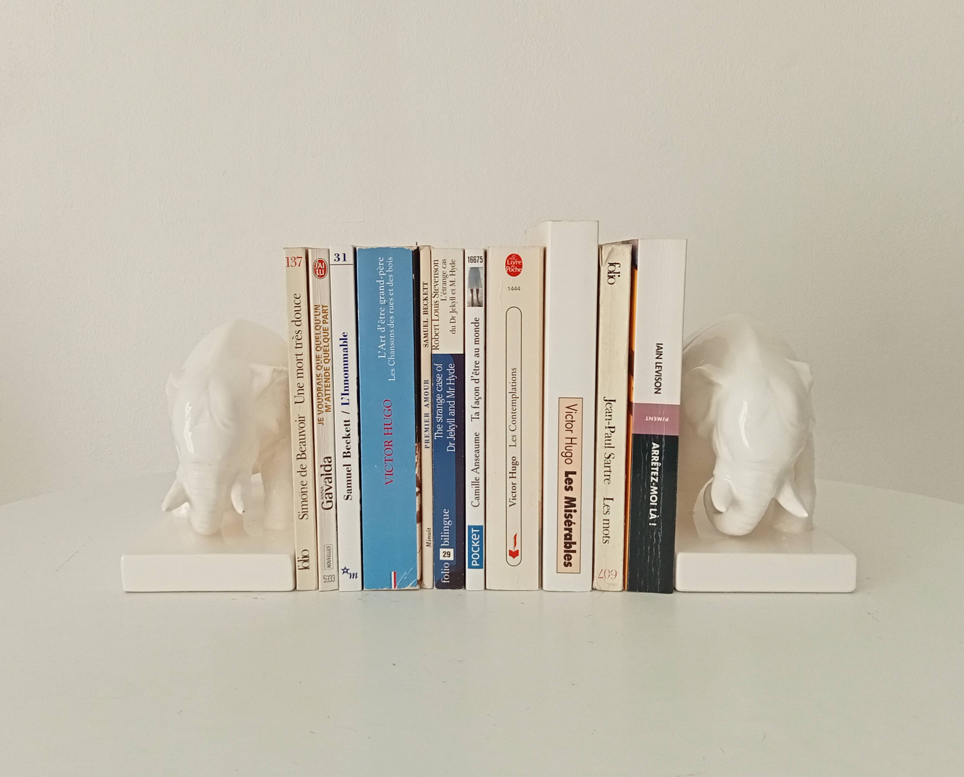 Pair of antique glazed ceramic bookends