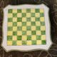 "Elephants" design chess table, enamelled, hand-painted.