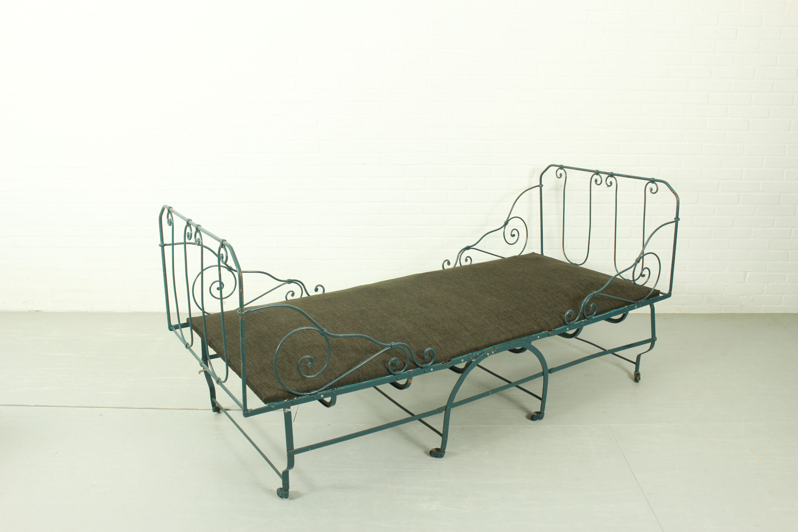 Foldable metal daybed with new webbing and upholstery