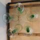 5 large green stemmed glasses
