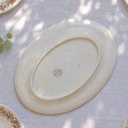 Plat ovale du XIXe siècle en terre de fer signé Longchamp "Liserons"