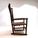 Manou rattan armchair with leather seat, 1960