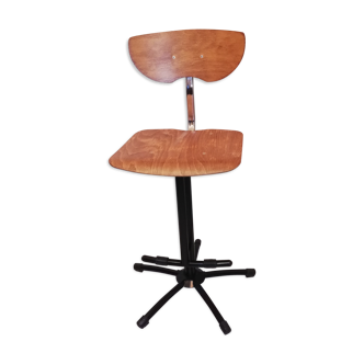 Industrial chair with height adjustment and foot rests