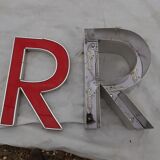 9 luminous industrial letters
