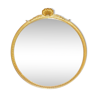 Miroir en bronze doré à coquille 55 cms