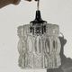 Suspension in molded glass 70s