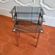 3 nesting tables from the 1970s in smoked glass.