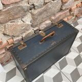 Midnight blue suitcase of representative 30s