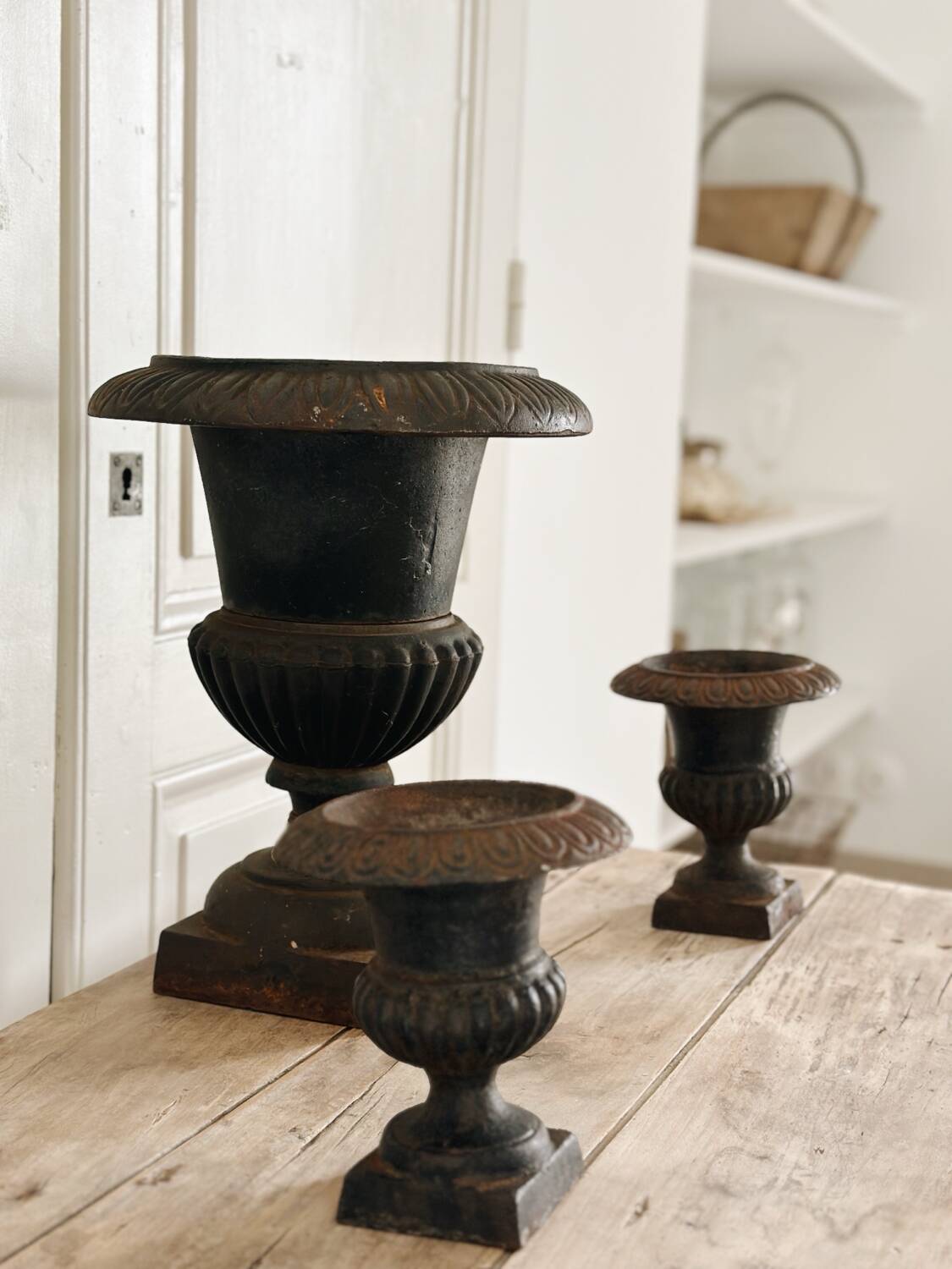 Set of three Medici cast iron vases