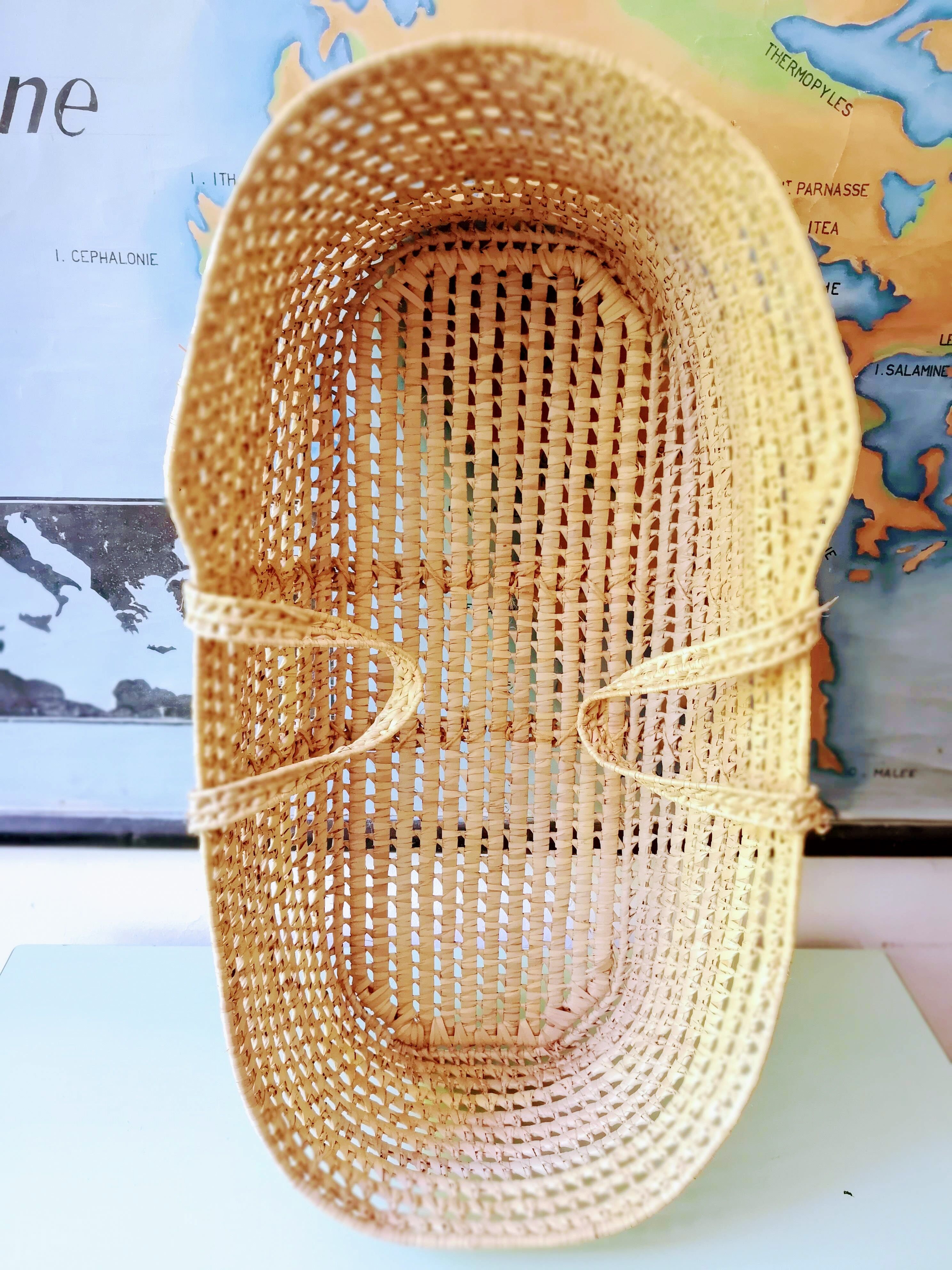 Vintage braided Wicker bassinet