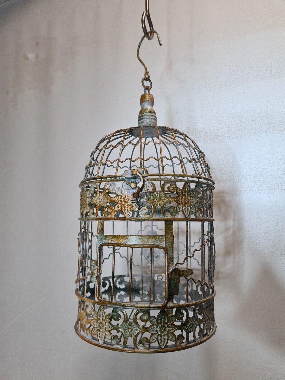 Round weathered iron birdcage
