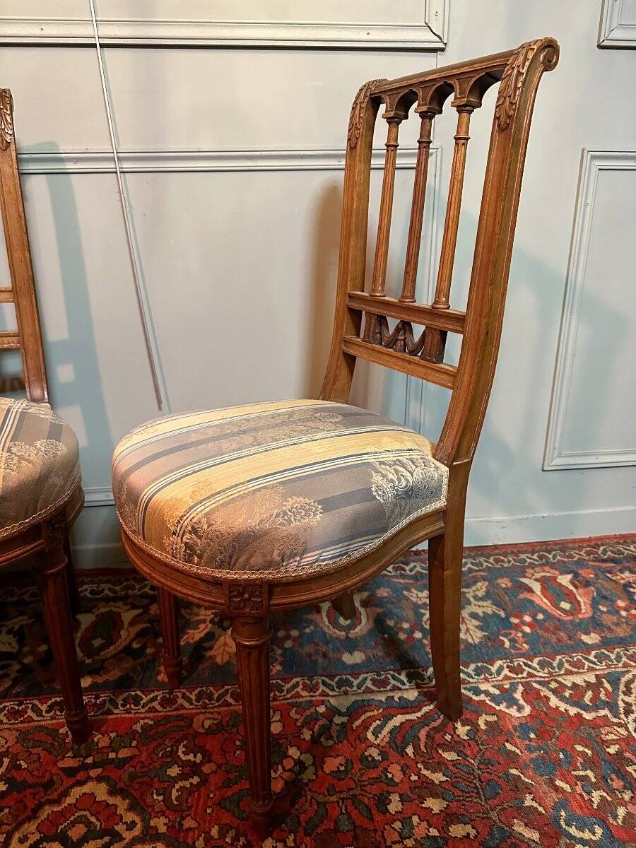 Pair Of Louis XVI Style Chairs In Walnut.